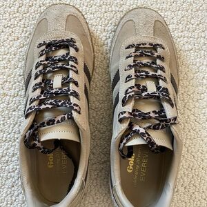 Gola Beige Sneakers with leopard print shoelaces.